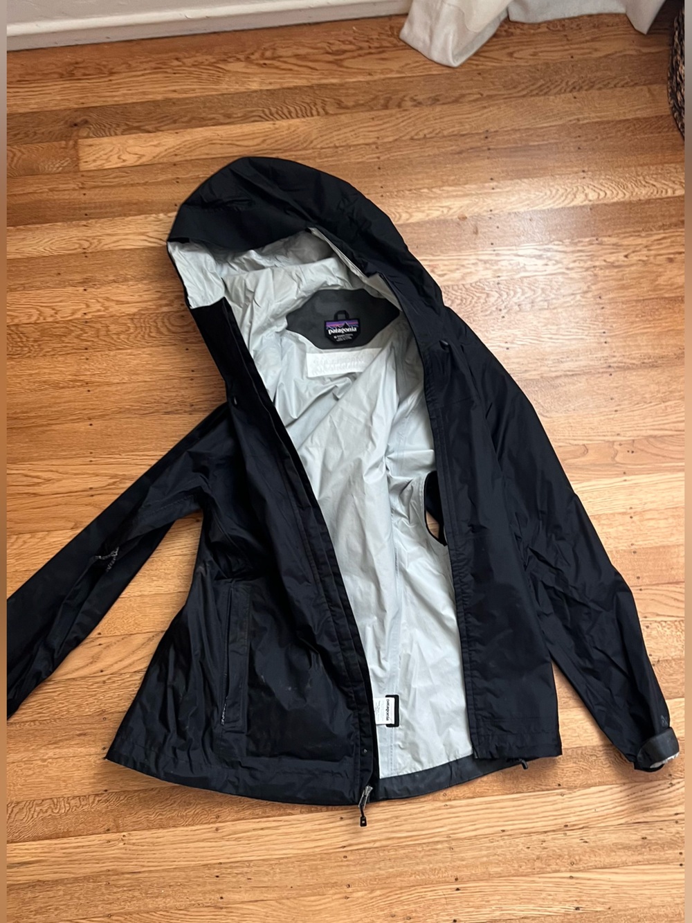 Patagonia Black Raincoat with Light Gray Lining